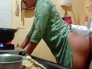 Hot neighbour aunty gets fucked by the young boy in kitchen